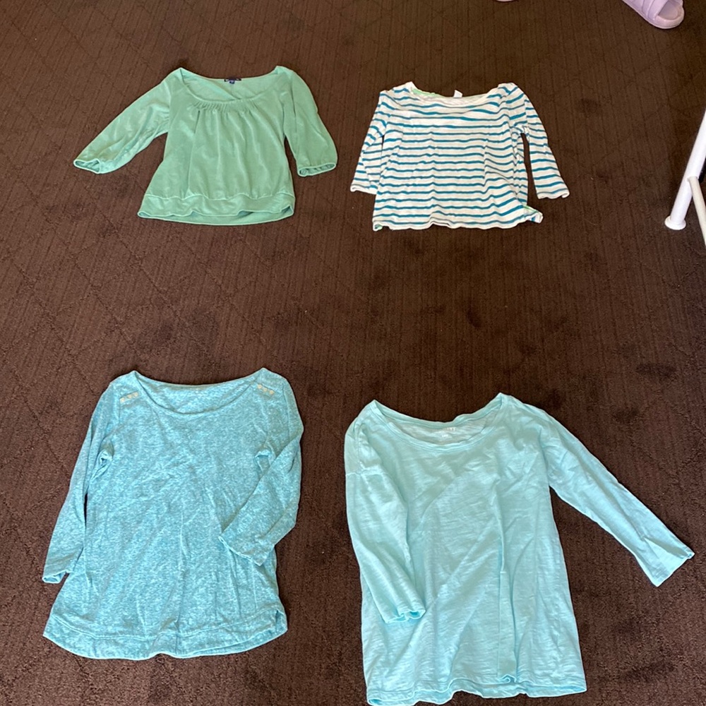 Four green and teal shirts